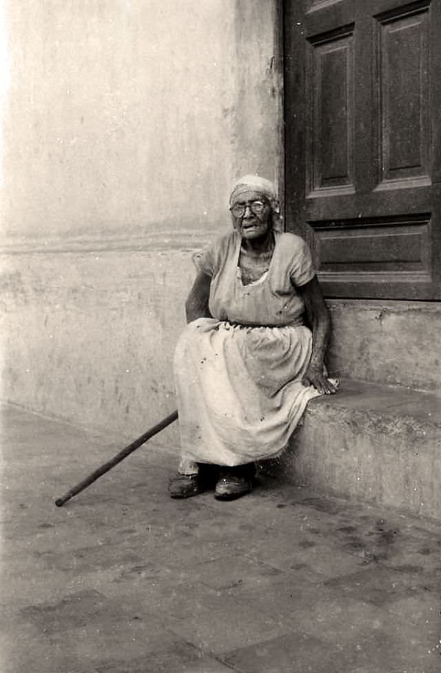 Old woman in door
