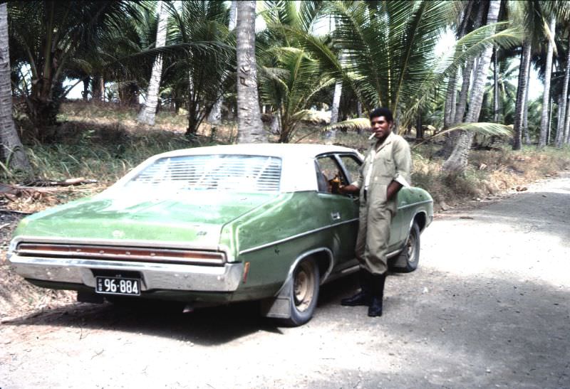 Ford Fairlane ZF on road near Hisiu, 1975