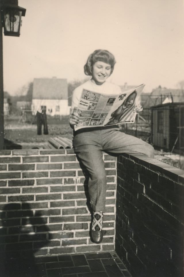 Woman reading a magazine outside