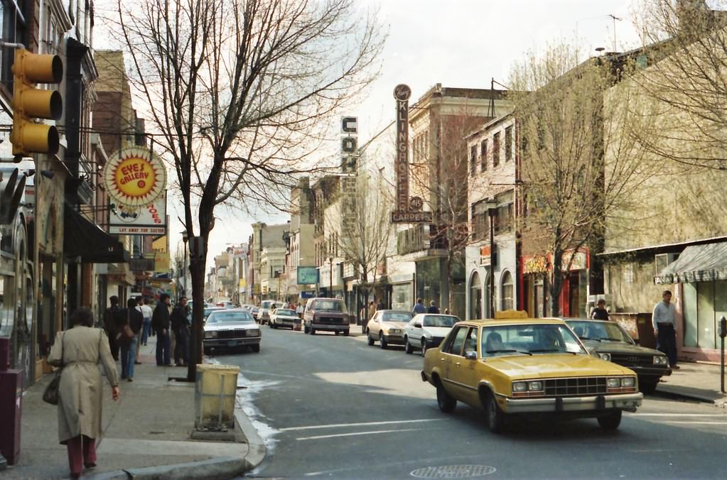 South Street from 4th Street Philadelphia April 1984 Eye's Gallery on the left and Jim's Steaks barely visible on the left front.