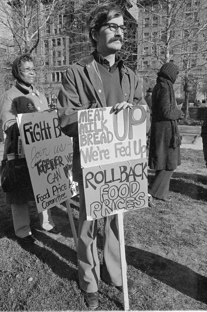 A demonstrator with a sign during an anti-inflation rally in Independence National Historical Park, Philadelphia, October 1984.