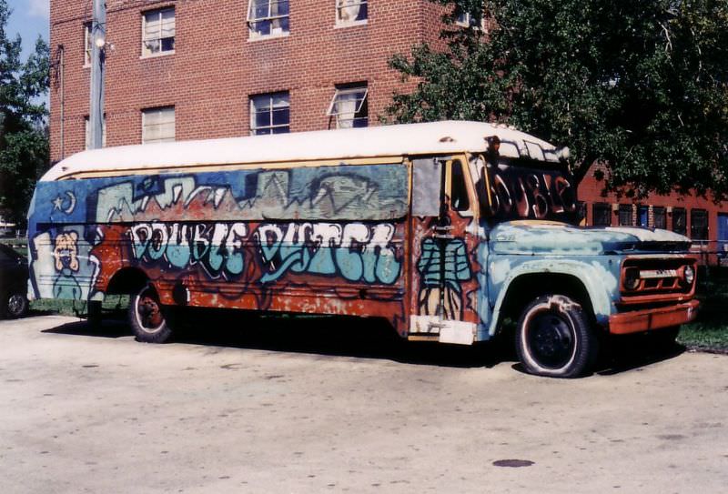 A 1962 Chevy school bus sitting outside the projects in North Philly in the Summer of 1985