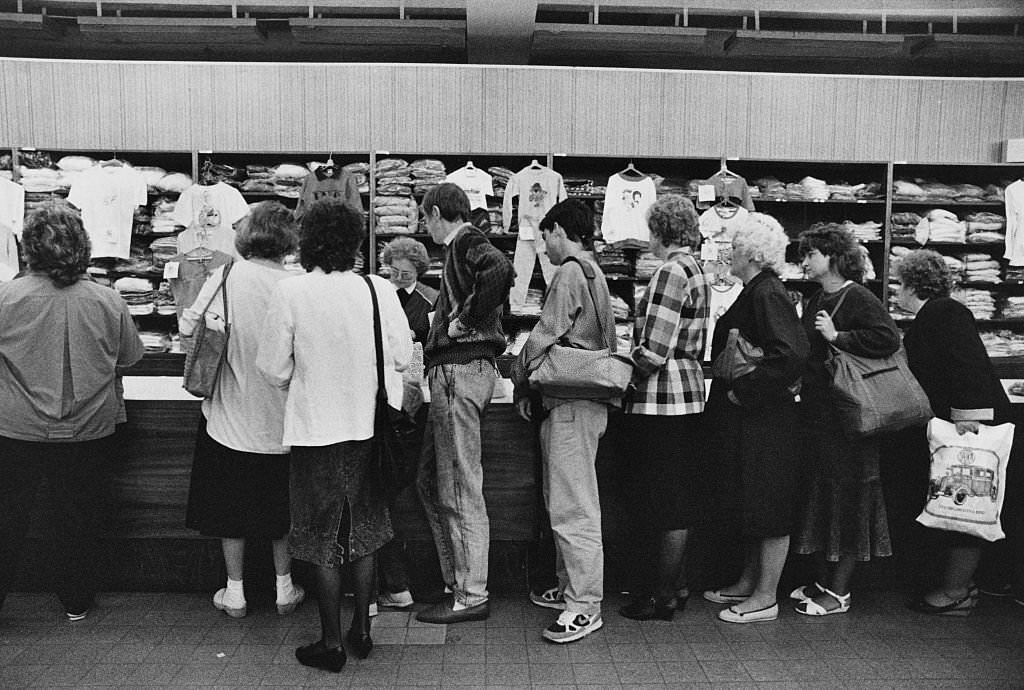 People queuing at a clothing store in Prague, Czechoslovakia, 5th June 1990.