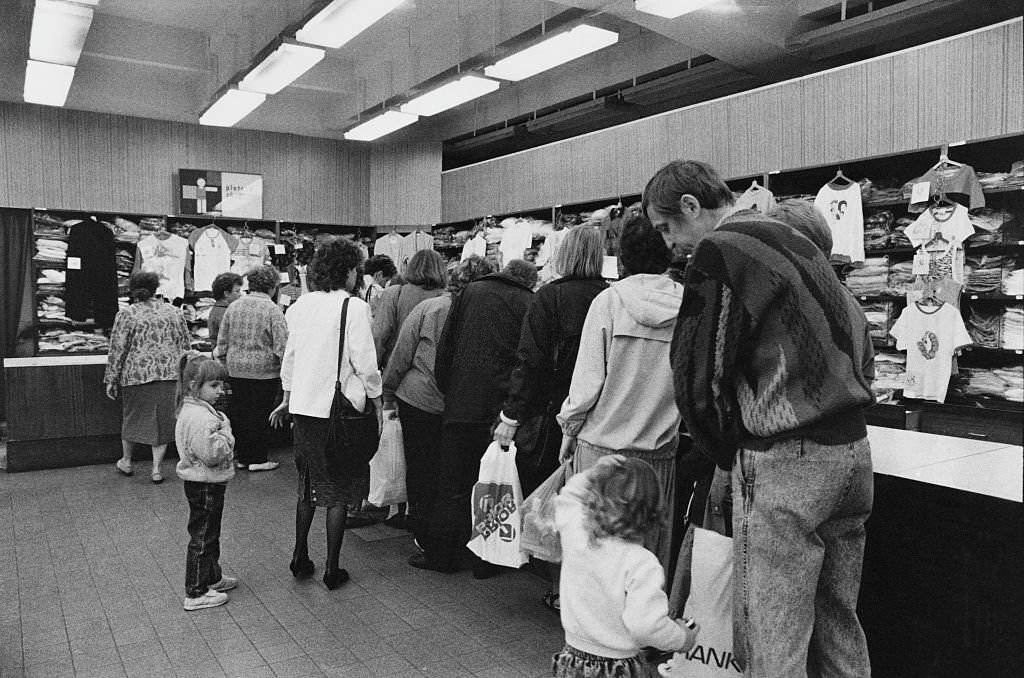 People queuing at a clothing store in Prague, Czechoslovakia, 5th June 1990.