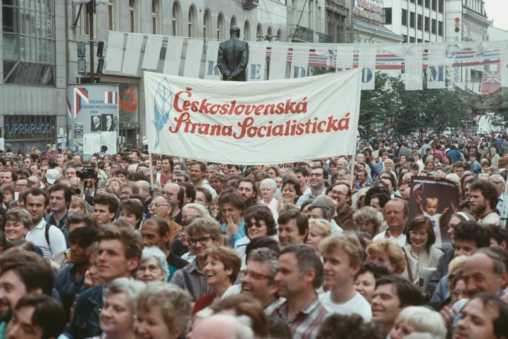 People attending a political rally in Prague, Czech Republic, June 1990.