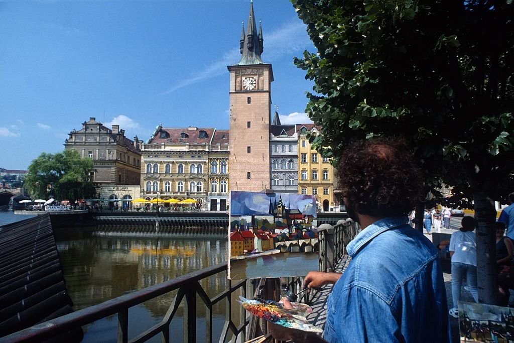 Painting by the Vltava River, Prague, 1995.