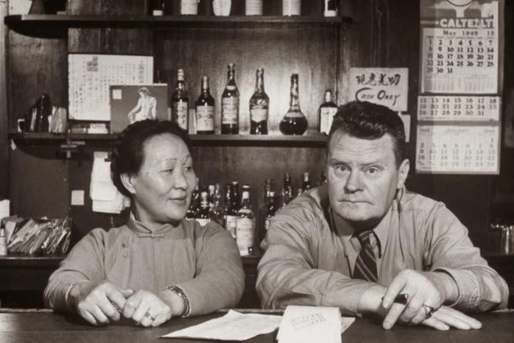 merican bar owner Frank and his Chinese wife in their bar.