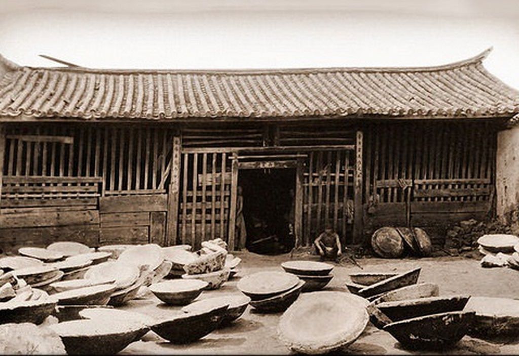 Bowl Shaped objects Scattered Outside A Building, Yunnan, China, 1922