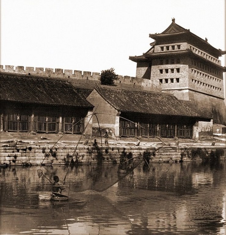 Fisherman in Grand Canal by the East Gate, Peking, China, 1907