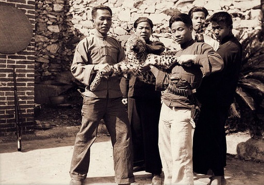 Men With Leopard at the Dongan Mission, China, 1932