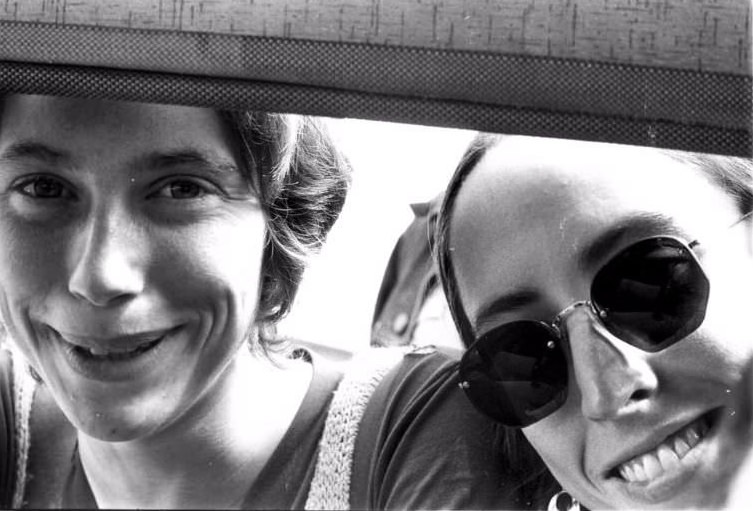 Young couple viewed through the window of a Rambler station wagon, at the Farm, San Francisco, 1976