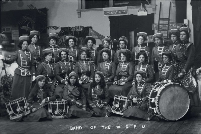 The Drum & Fife Band performing in a procession to promote the Women’s Exhibition, May 1909