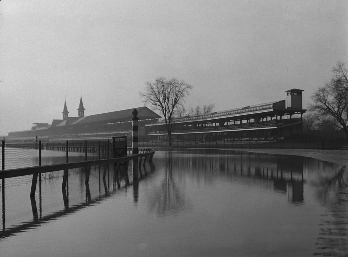 Flood waters cover the track and infield at Louisville’s famous Churchill Downs racetrack, 1937.