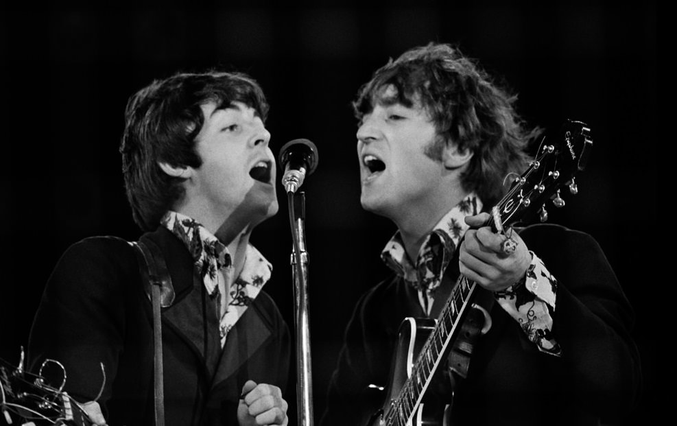 Paul McCartney and John Lennon performing at the Beatles last concert at Candlestick Park in San Francisco, California, August 29 1966.