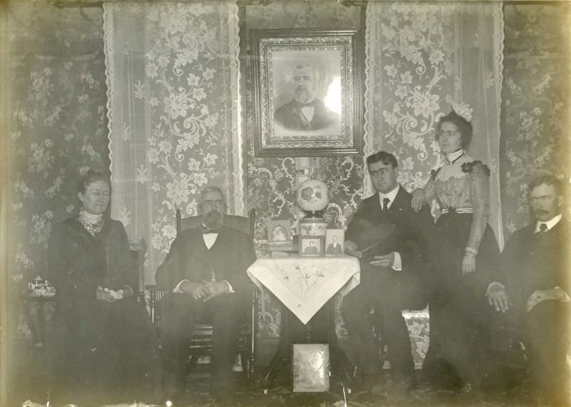 Family seated in room