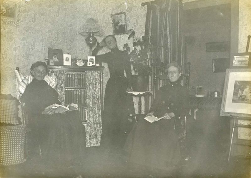 Three women in corner of room