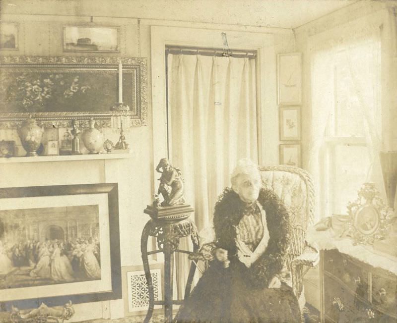 Woman seated in wicker chair