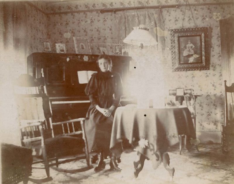 Young woman seated at piano