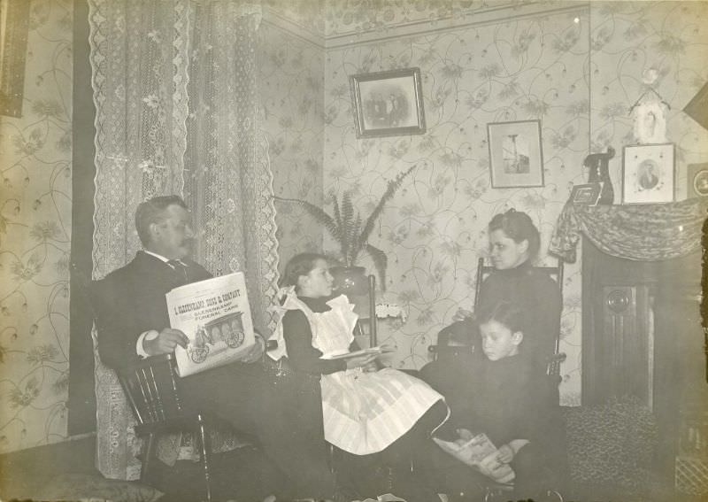 Family reading in corner of room