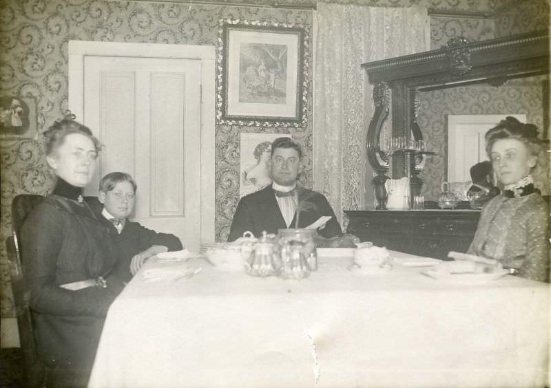 Family seated at dining room table