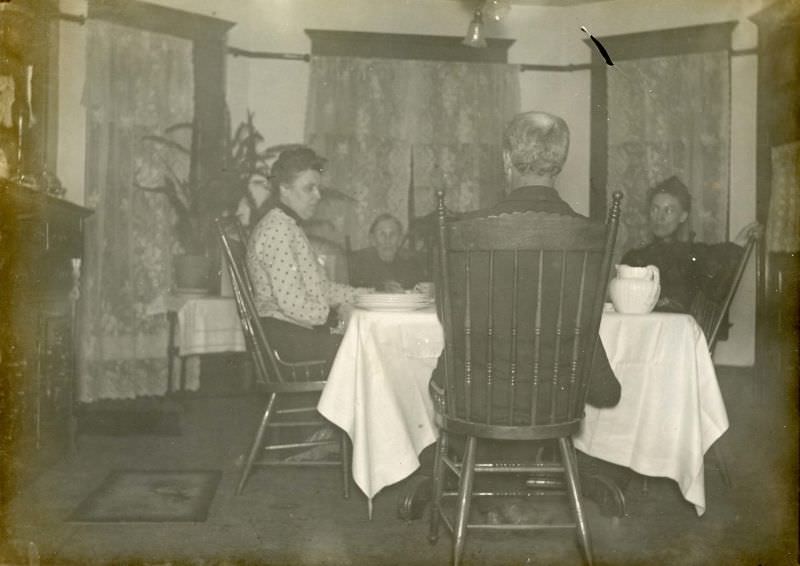 Family seated in dining room