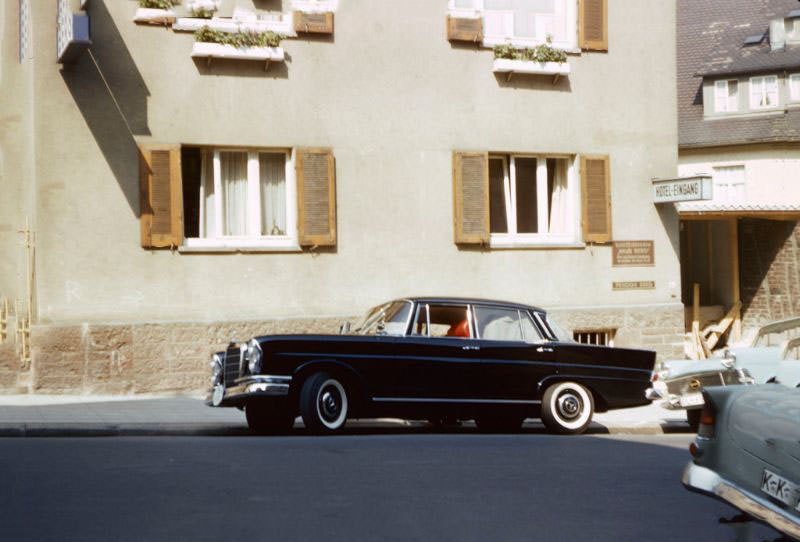The Mercedes 220 parked in front of Haus Berg, a hotel in Stuttgart, 1960s