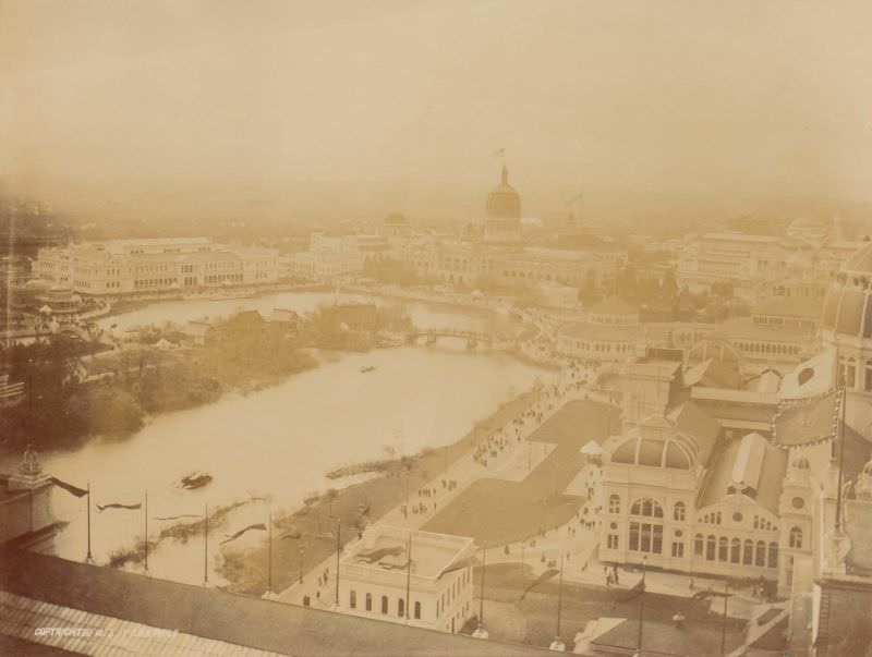 Lagoon with Illinois State Building in center back, Women's Building to left, Fisheries and Government Buildings to right, Chicago, 1893
