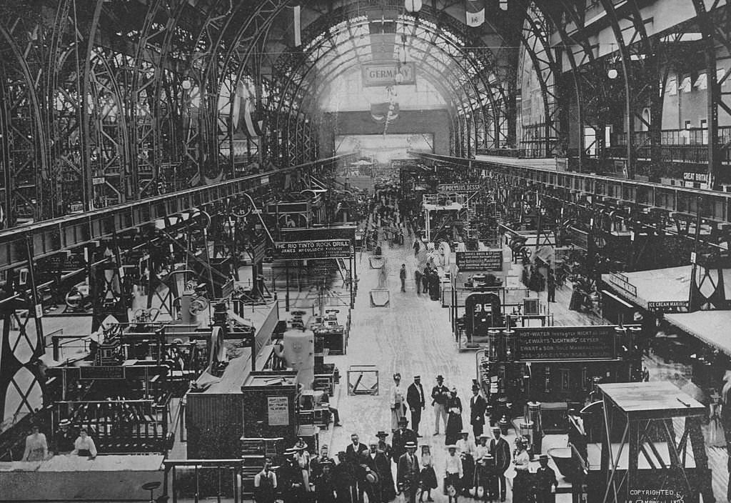 The interior of Machinery Hall, looking west, showing a section of the German exhibit at the World's Columbian Exposition in Chicago, 1893.