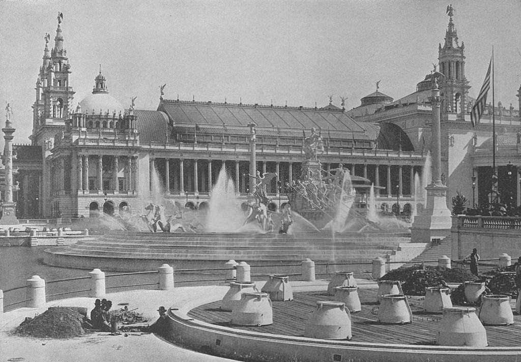 The Electric Fountain, MacMonnies' Fountain and the east section of the Palace of Mechanical Arts at the World's Columbian Exposition in Chicago, Illinois, 1893.