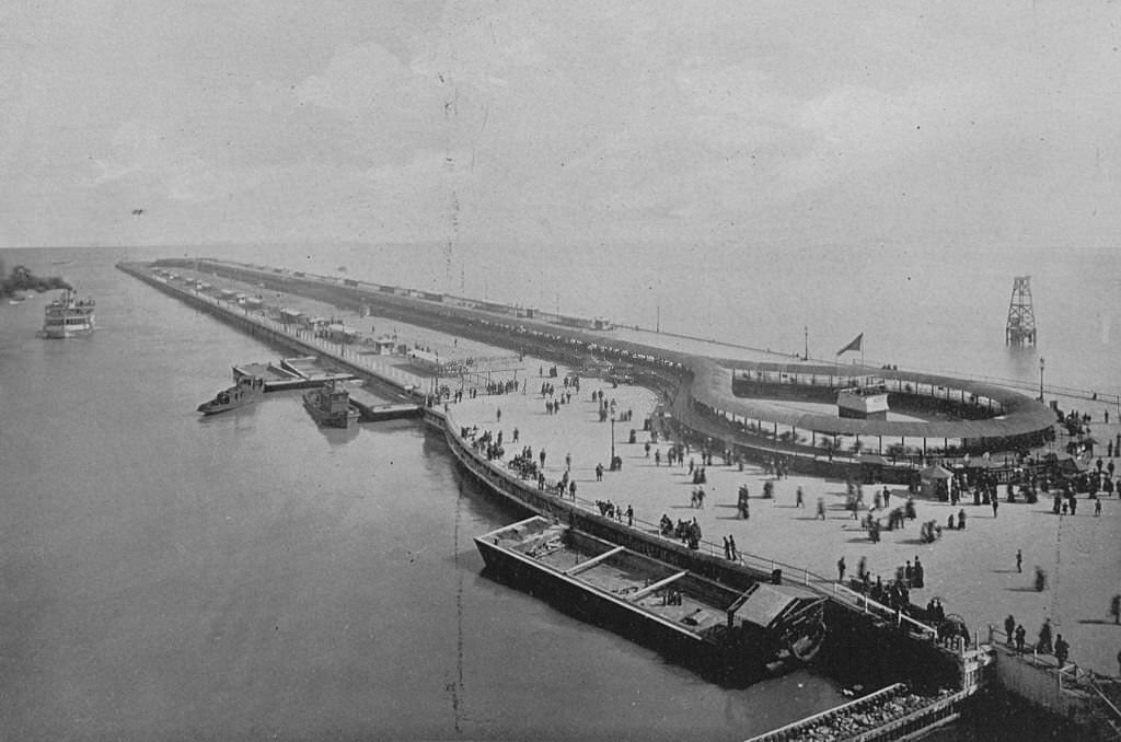 The Pier at the east entrance to the exposition grounds, showing a full view of the Sliding Sidewalk at the World's Columbian Exposition in Chicago, Illinois, 1893.