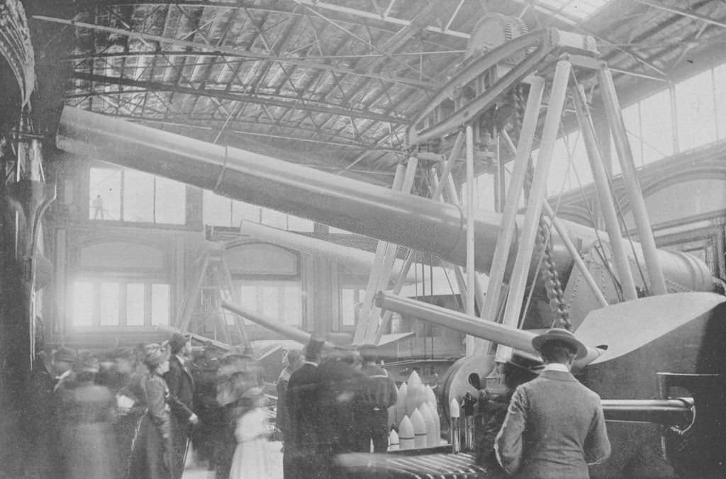An interior view of the Krupp Gun Works Building showing the 122-ton gun at the World's Columbian Exposition in Chicago, Illinois, 1893.