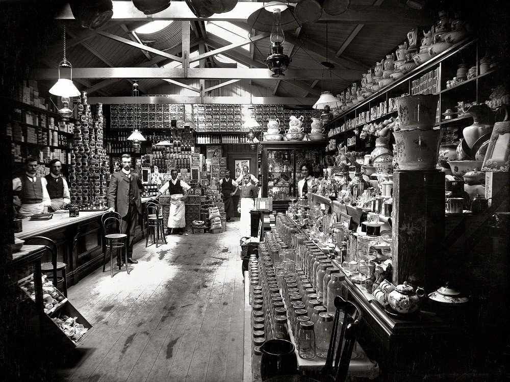Grocery shop interior, with staff, New Zealand, 1890s