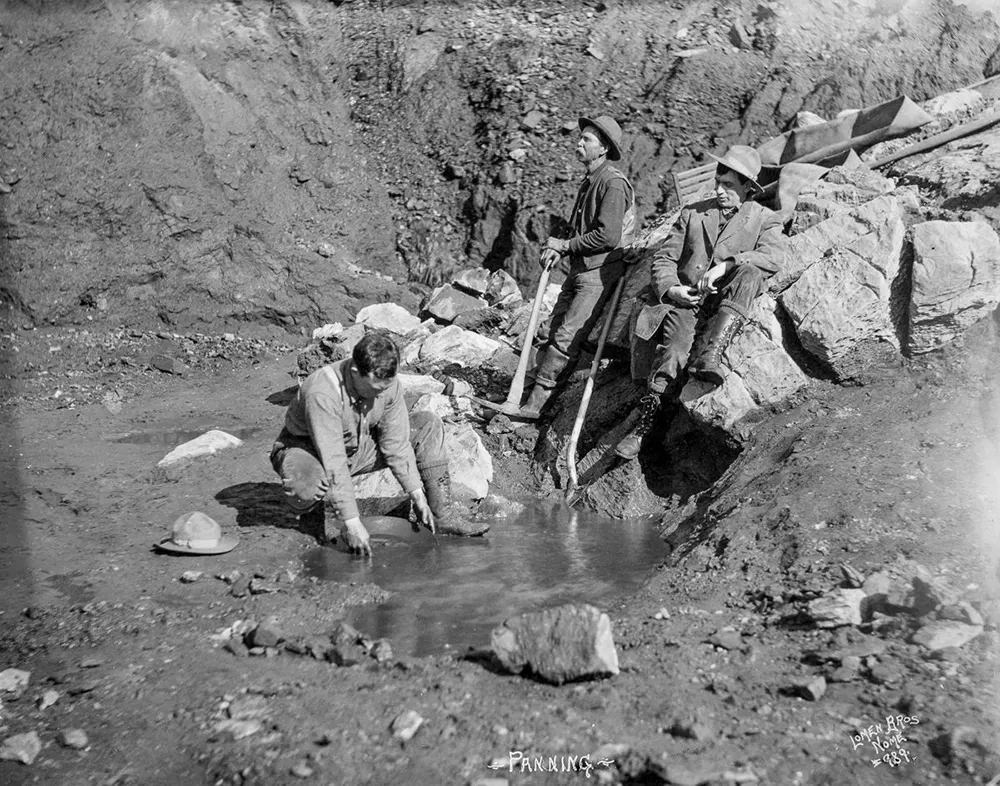 Men panning for gold (during the Alaskan Gold Rush).