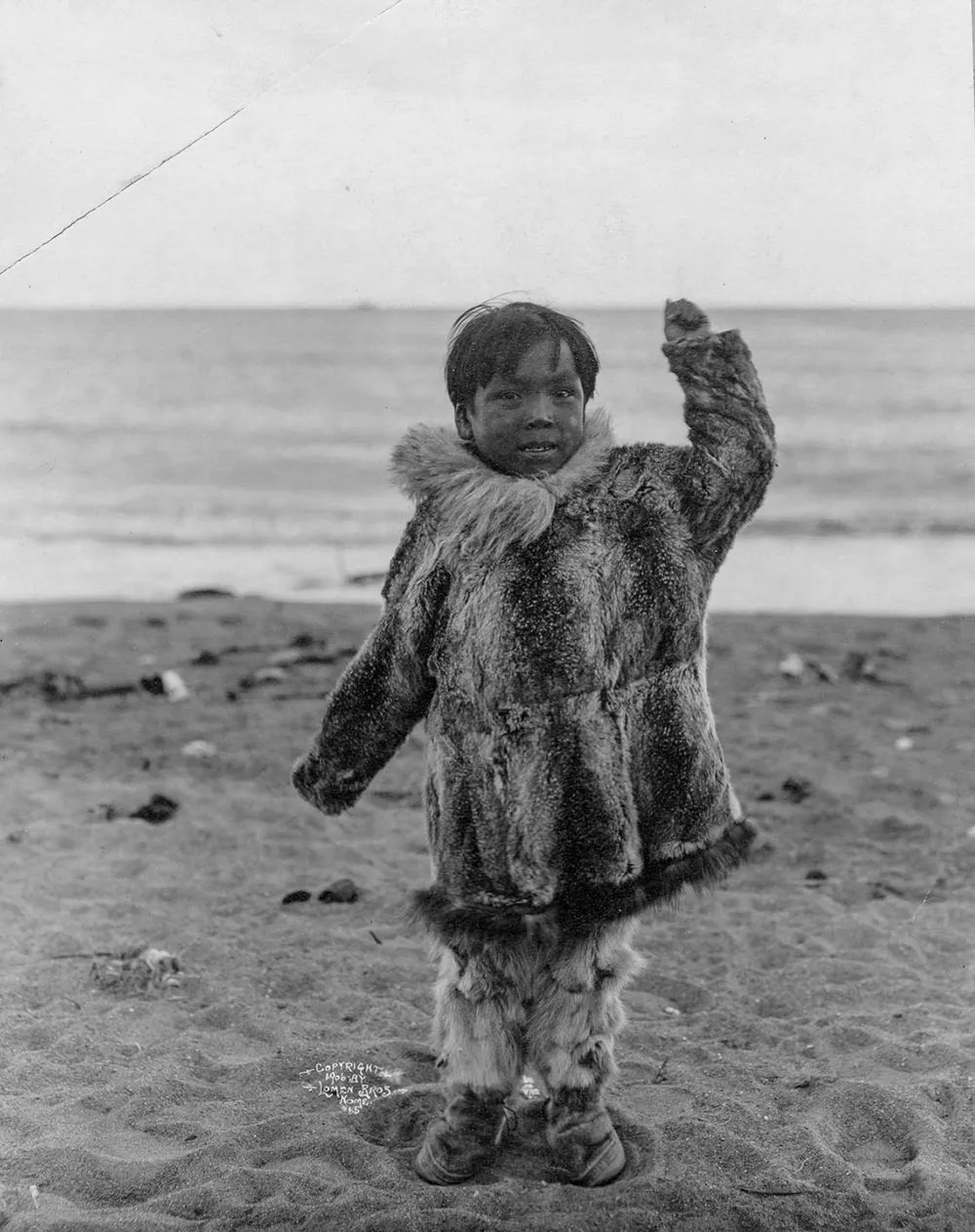 Child on beach. 1906.
