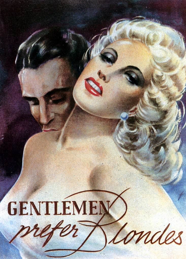 A man kisses the exposed shoulder of a buxom blonde woman above the words 'Gentleman Prefer Blondes, 1944.