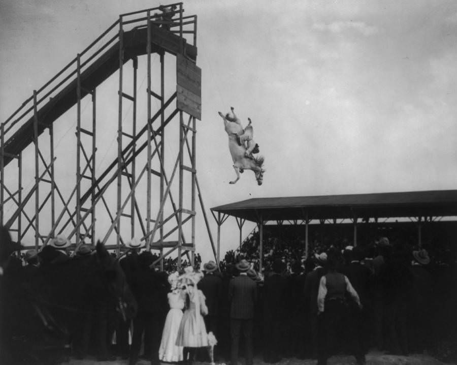 Spectators watch a horse diving act at an unspecified location (perhaps Pueblo, Colorado) on July 4, 1905.