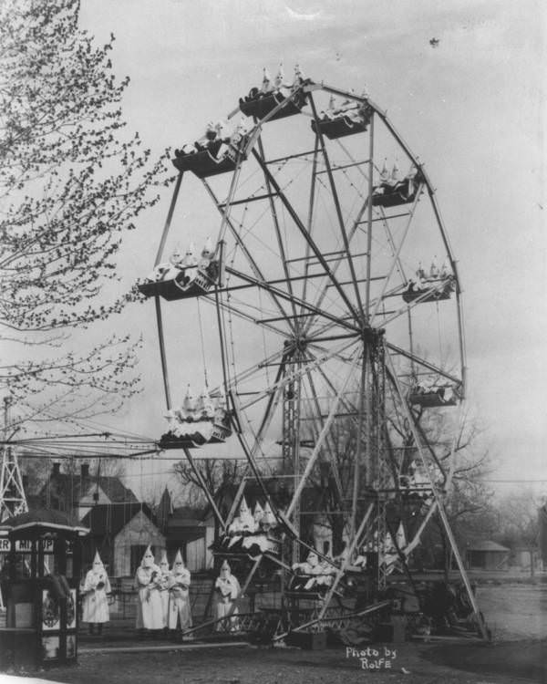 In April 1926, dozens of Ku Klux Klan members in Cañon City, Colorado walked down Main Street and enjoyed some fun and frivolity on a traveling carnival's Ferris wheel.