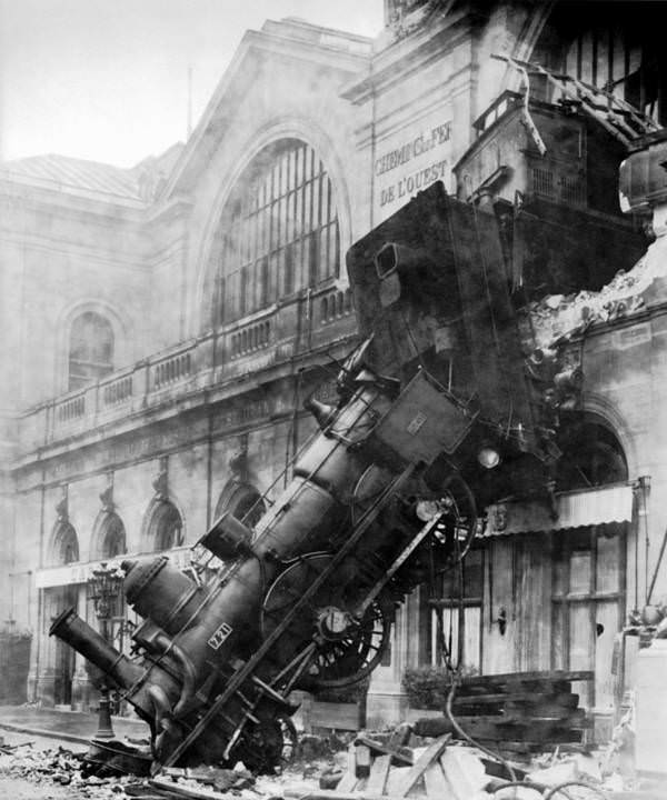 A train lays wrecked after entering Paris' Montparnasse station too fast and failing to brake before crashing through the station wall and down onto the street below on October 22, 1895.