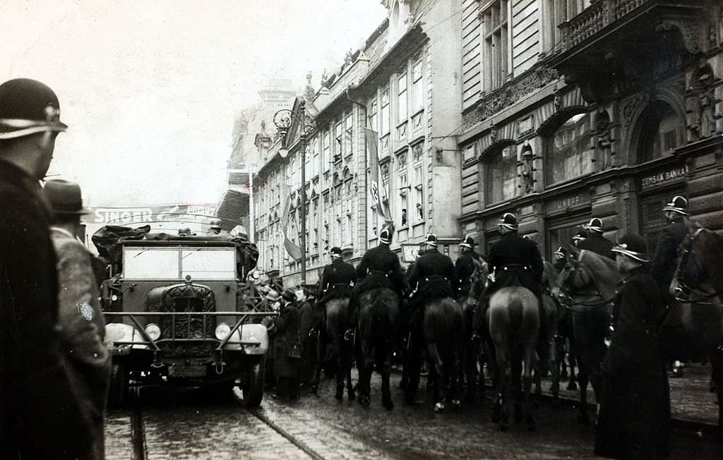 The Occupation of Czechoslovakia, Czech mounted police watching a German truck pass through the streets of Prague