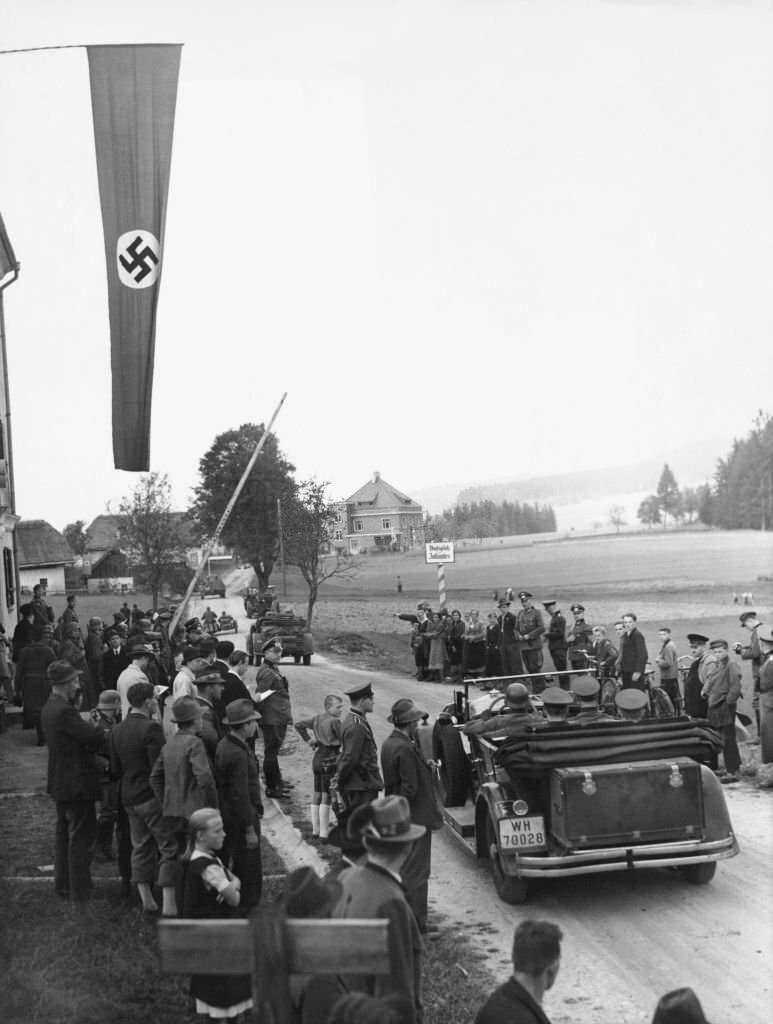 A German Wehrmacht motorised column passes through the border crossing at Waldhaeusl in the occupied Sudetenland of Czechoslovakia on 3rd October 1938 at Waldhaeusl in Czechoslovakia.