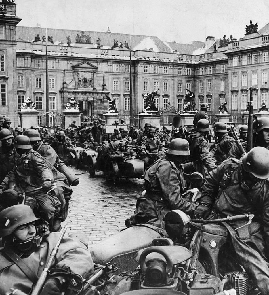 German soldiers on motorbikes during the invasion of Prague, Czechoslovakia.