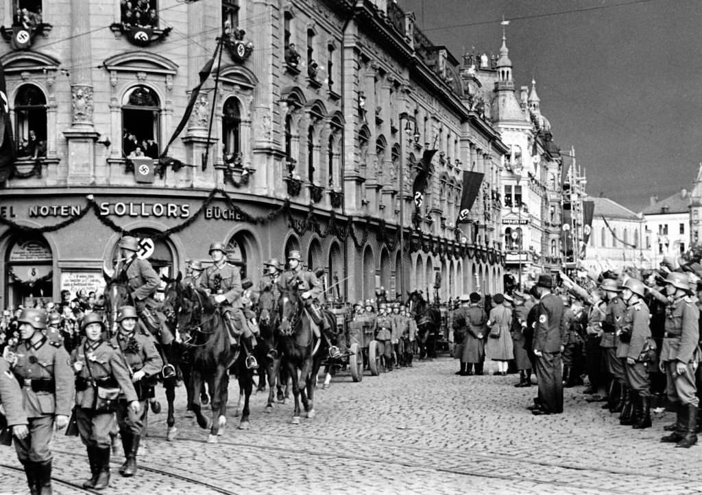 The German propaganda picture shows German troops marching into Reichenberg, Sudetenland (today Liberec, Czech Republic) in October 1938.