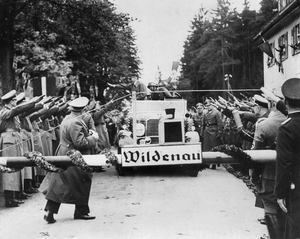 Adolf Hitler crosses the Wildenau border from Germany into Sudetenland with his troops at the start of World War II. Sudetenland or Sudety, formerly a frontier region of the Czech Republic was ceded to Germany in the Munich Pact, but restored after the war. (Photo by Keystone/Getty Images)