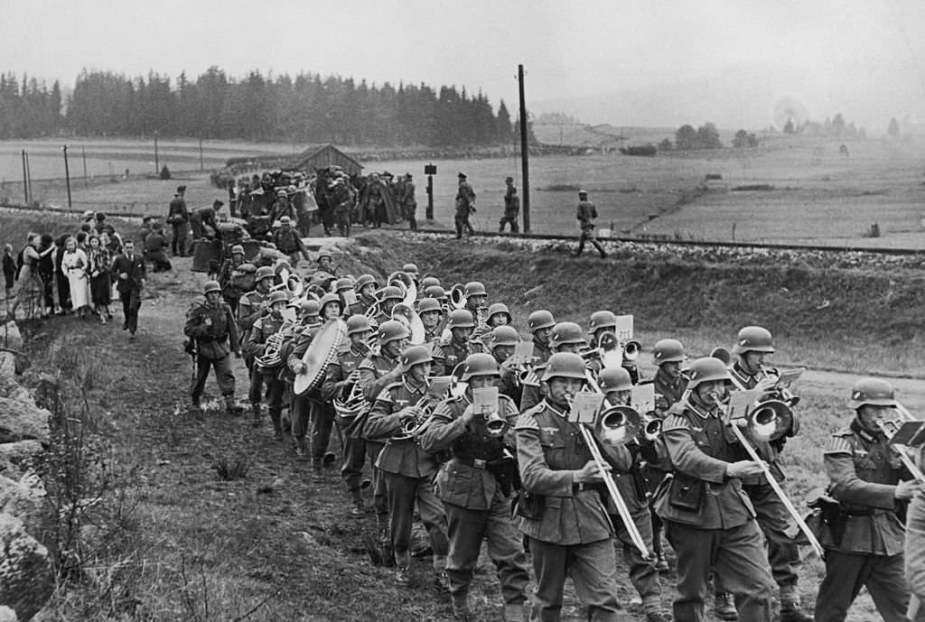 A German marching band crosses the border near Haidmuhle in Bavaria to enter the Sudetenland, as Germany begins its annexation of the region, 1st October 1938.