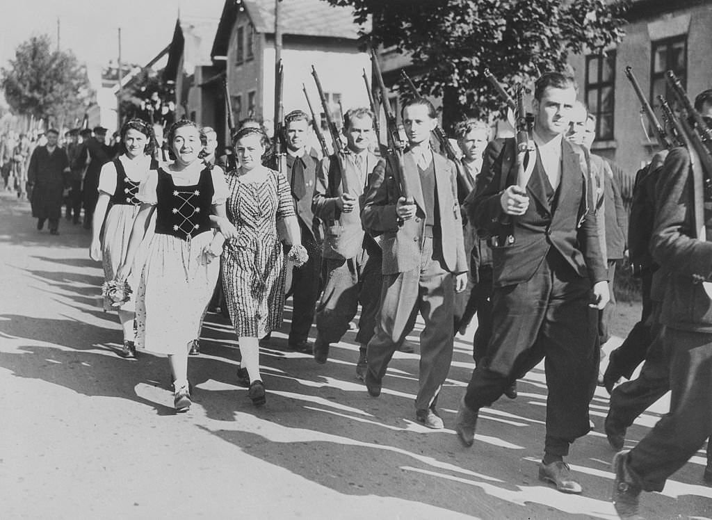 These Sudeten German civilians who fled into Germany during the Czech-German crisis might be called the Vanguard of the German army of occupation.