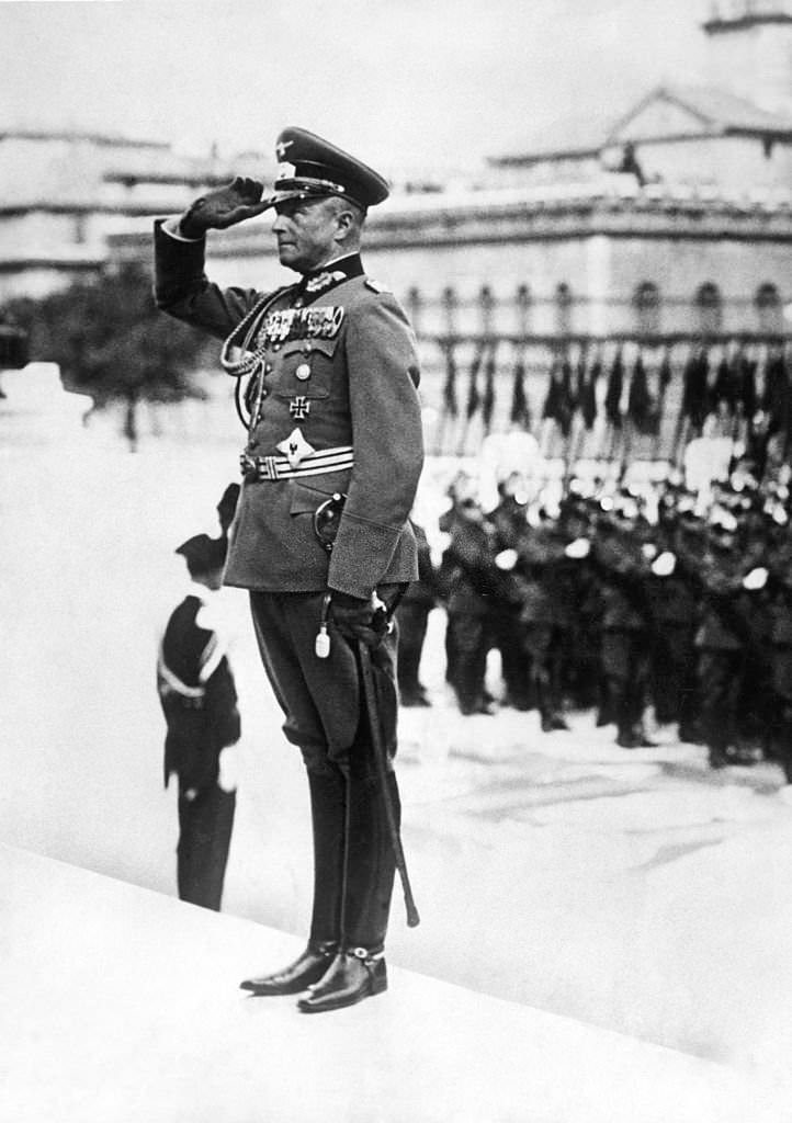 German Soldier Saluting at Ceremony.