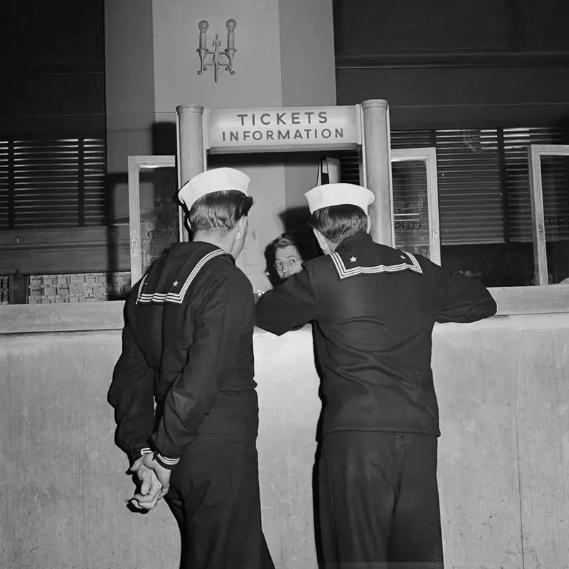 Sailors purchase Greyhound tickets in Chicago.