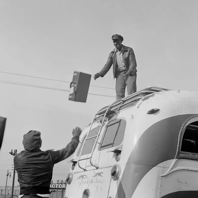 Porters load luggage on a bus in Chattanooga.