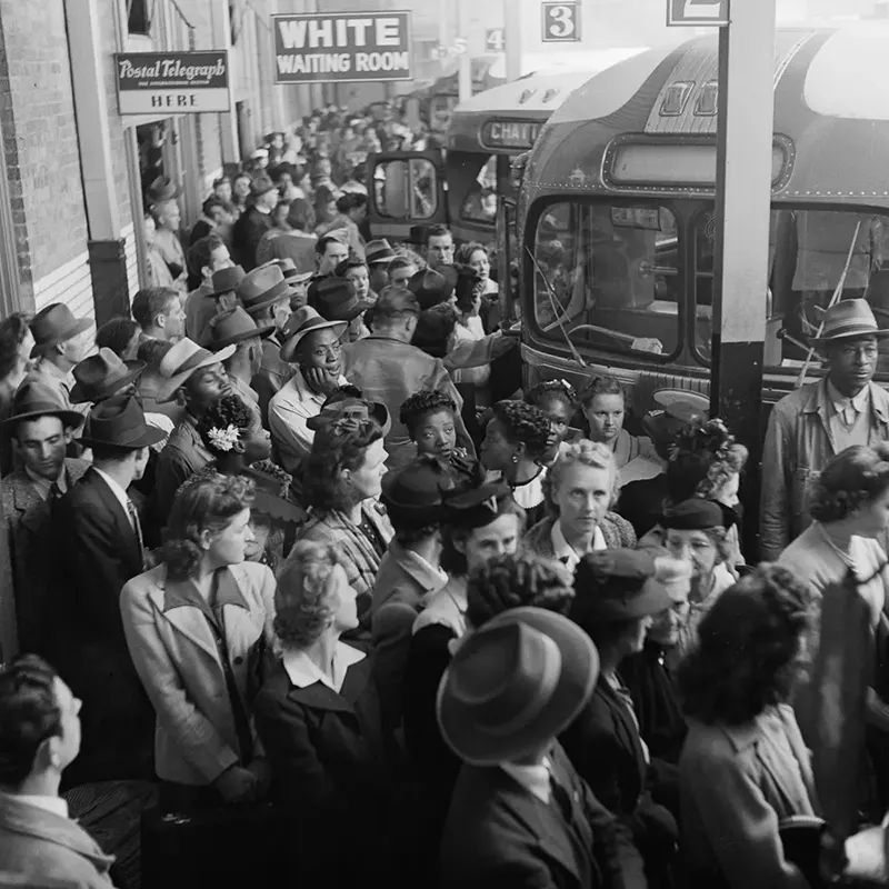 Passengers board buses at the Memphis Greyhound station.