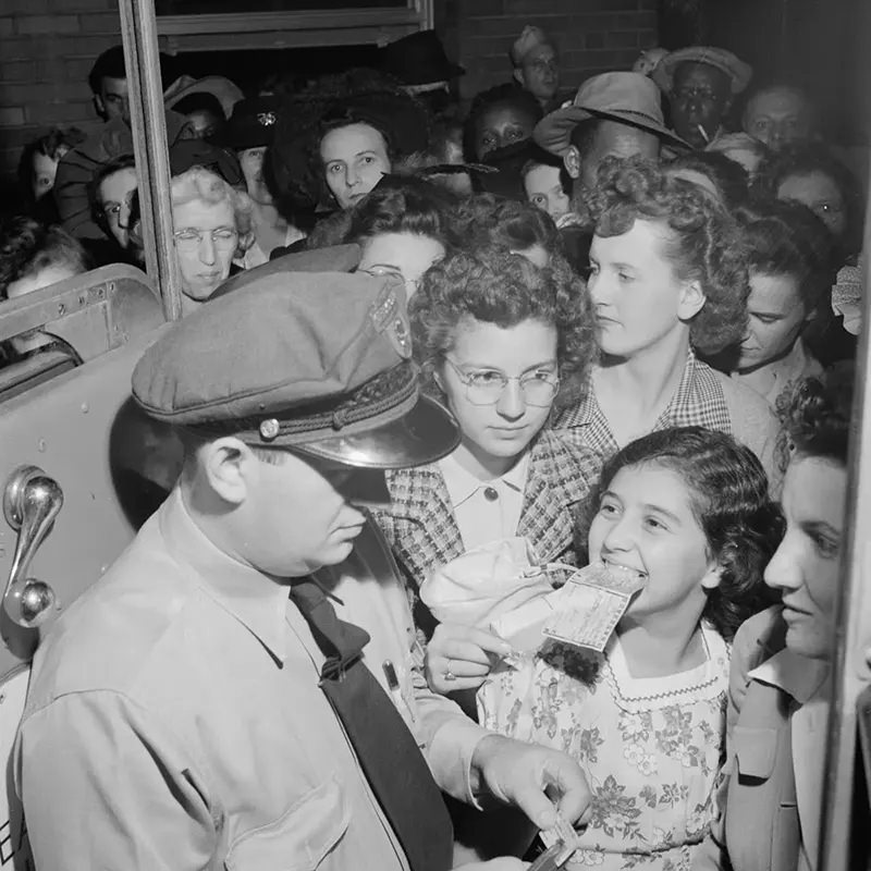 A Greyhound driver checks tickets in Columbus, Ohio.